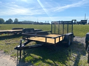 Utility Trailer Tandem Axle  This tandem utility trailer has 2 3500# brake axles making it a 7k trailer. It features a spring assist tailgate, a fully powder coated 