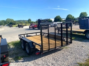 Utility Trailer Tandem Axle This tandem utility trailer has 2 3500# brake axles making it a 7k trailer. It features a spring assist tailgate, a fully powder coated 